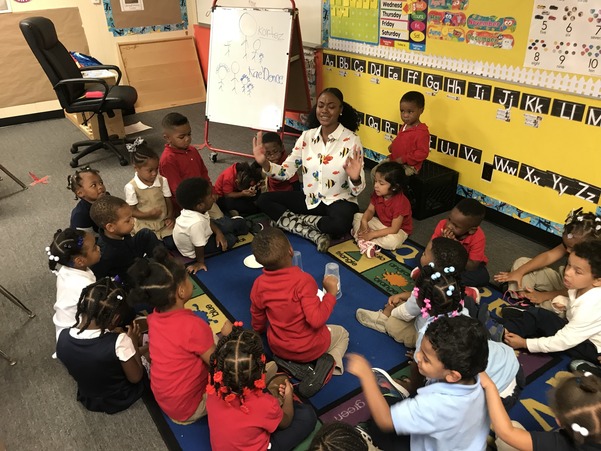 teacher instructing during circle time