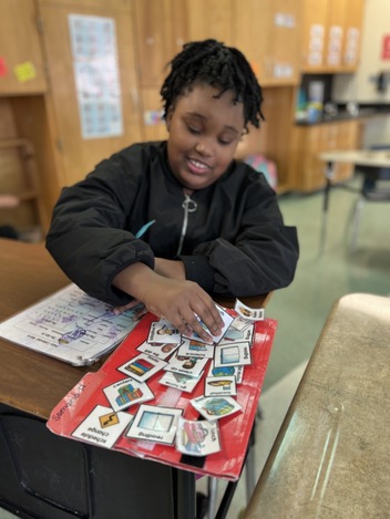 student using her visual schedule