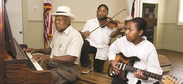 Three musicians in the Kerr Community Center