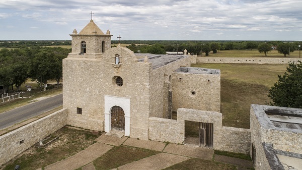 Aerial view of the stone chapel of a Spanish-style fort