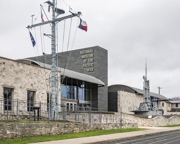 stone and brick building with National Museum of the Pacific War on the side