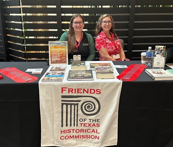 FTHC staff members at an exhibit table