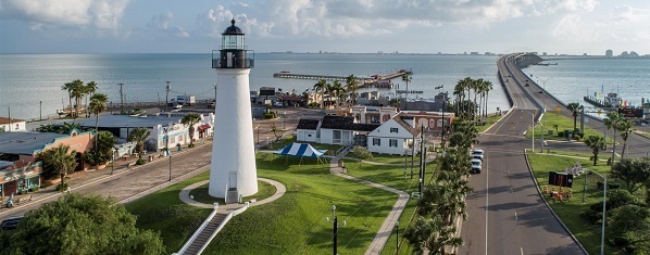 White lighthouse overlooking open water