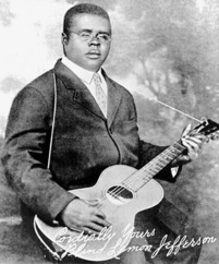 Black and white photograph of Texas blues guitarist Blind Lemon Jefferson.