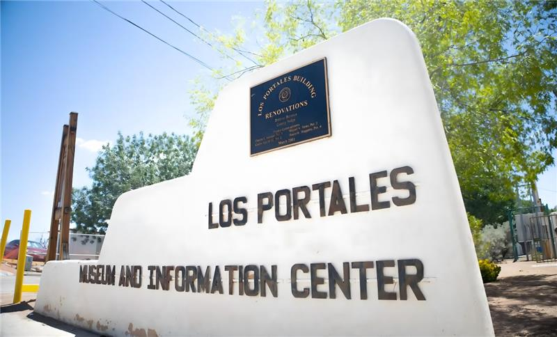 White Adobe sign of Los Portales Museum and Information Center 