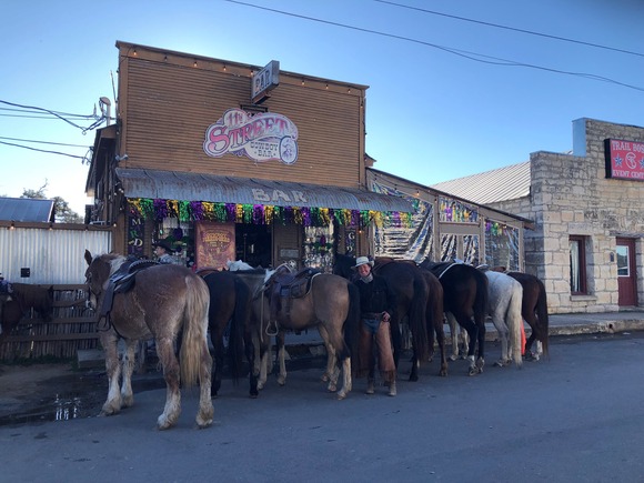 Horses in front of a bar in Bandera 