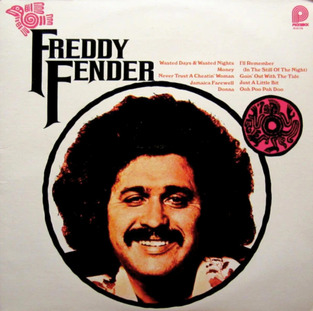 Color photo of a vinyl album cover with the name of the artist that reads "Freddy Fender"