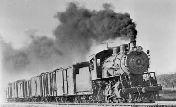 historical black and white photo of steam engine 