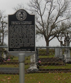 An HTC interpretive marker stands at Trinity Lutheran Church Cemetery in Colorado County