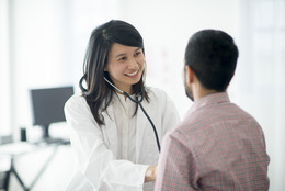 female doctor with male patient 