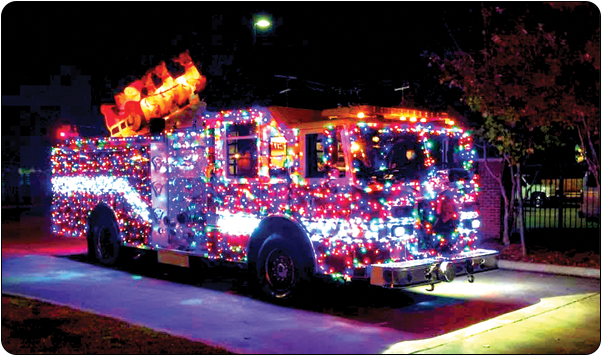 Holiday Cheer Fire Engine decorated in sparkling holiday lights.