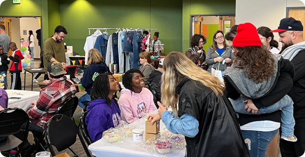 Image of kids selling their homemade goods at the 2023 Youth Pop-up shop.