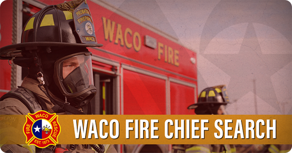 Waco Firefighters in front of a fire engine.