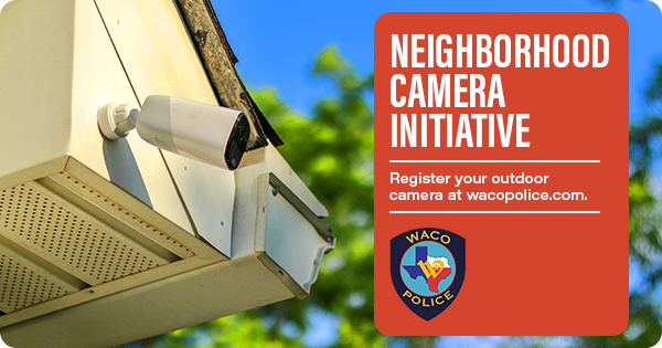 An outdoor camera under a house's eave