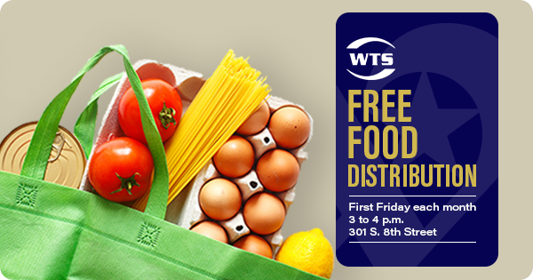 Grocery bag with a can, tomatoes, spaghetti, egg carton, and a lemon.