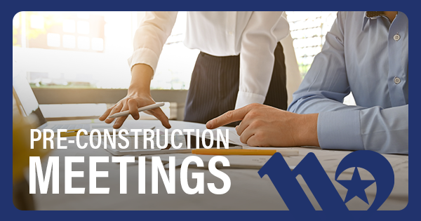 Developers reviewing construction plans