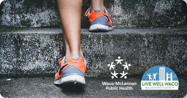 Close up of a person climbing up stairs