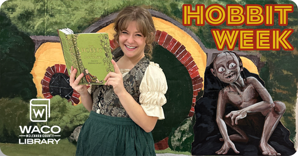Woman holding The Hobbit book in Middle Earth inspired clothes. An illustration of Gollum.