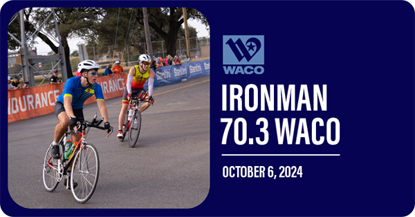 Two men riding bicycles in a race