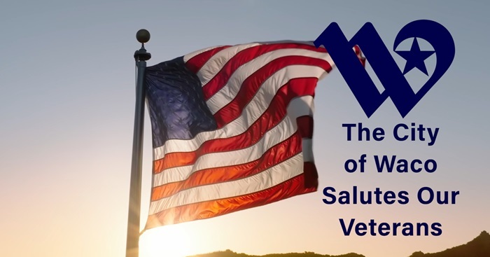 United States flag on a flagpole in front of a sunset