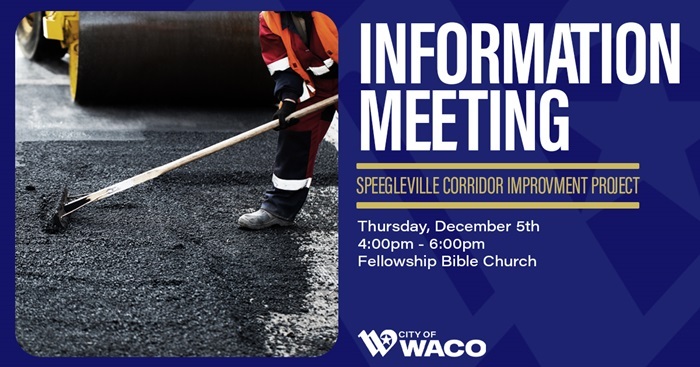 Closeup of a man spreading out tar on a street construction project
