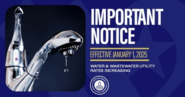 A chrome faucet with water dripping