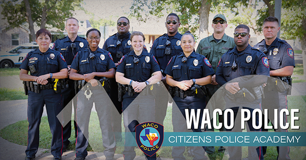 Group of ten police officers standing in a row