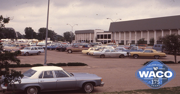 Sepia toned photo of the Waco Convention Center and parking lot in the early 80s