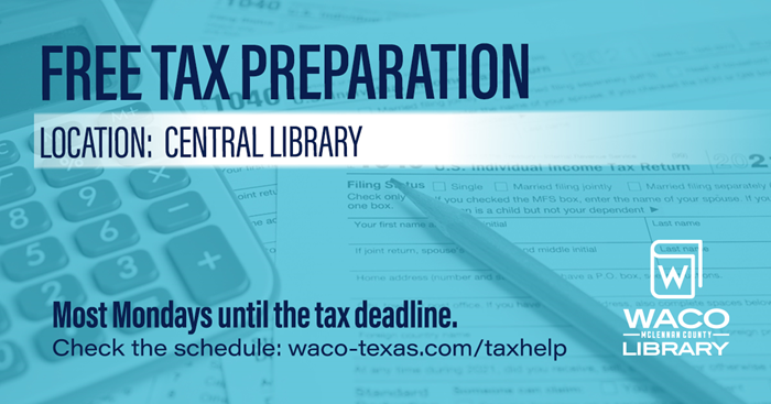 Tax documents, a calculator, and a pencil