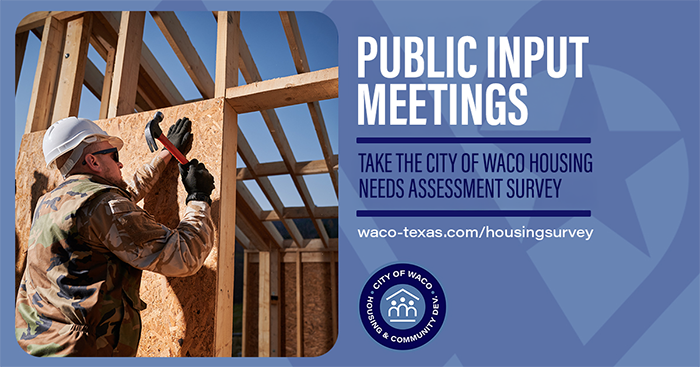 A man building a house holding a hammer
