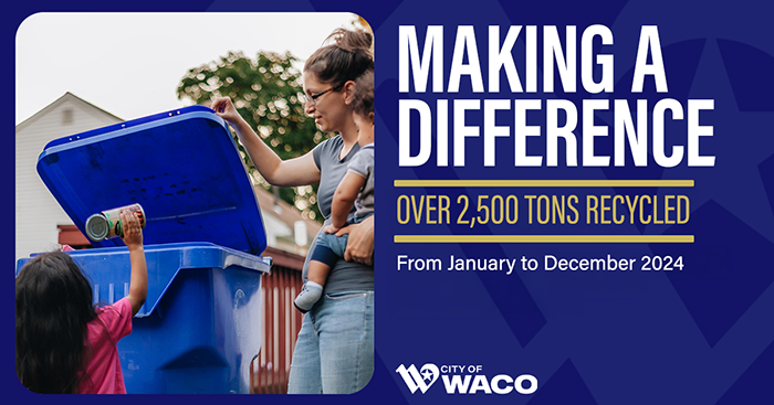 A mom with her baby opening a recycling bin for her daughter to recycle a can