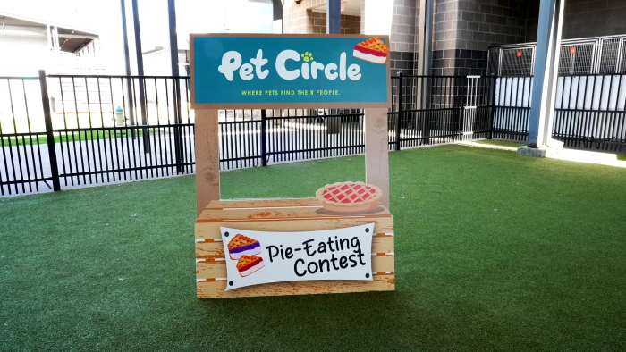 A pie-eating contest booth at Pet Circle Regional Animal Center