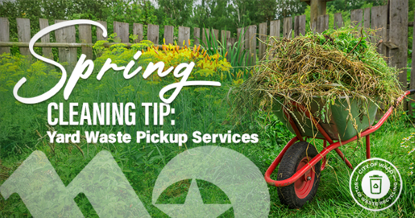 A wheelbarrow filled with yard waste