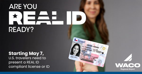 A woman holding her Texas drivers license with a yellow star