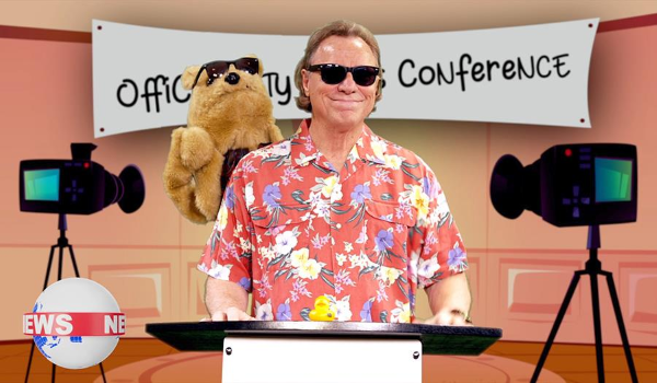 Mayor Holmes in a Hawaiian shirt during a cartoon press conference