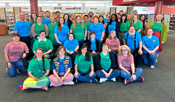 Group photo of Waco Library staff wearing Summer Reading Challenge t-shirts