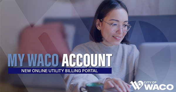 A woman typing on her laptop keyboard