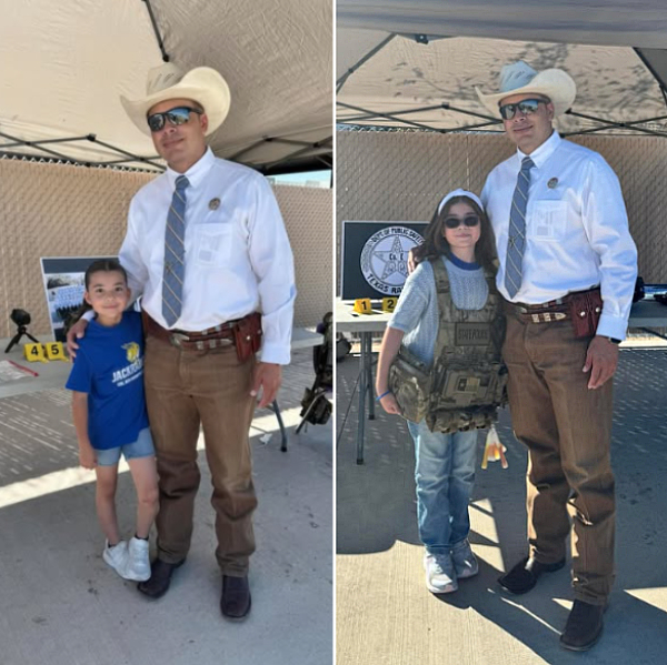Brent Mata and daughters under tent