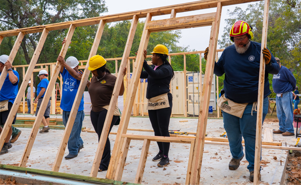 City of Waco staff building a house