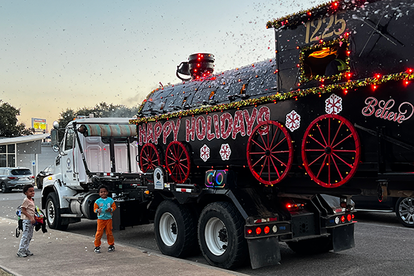 Kids with the Solid Waste Polar Express truck