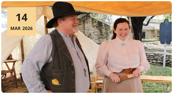 Reenactors in front of tent