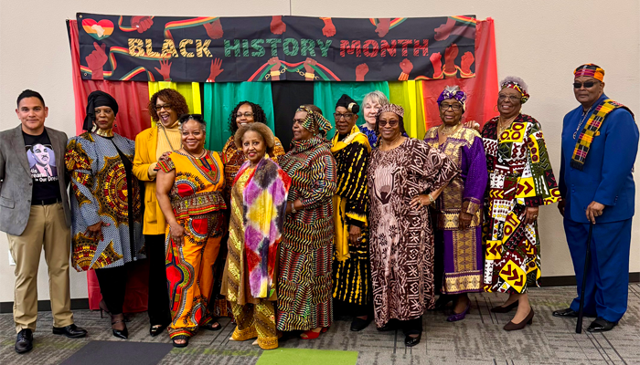 Group of people wearing traditional African clothing