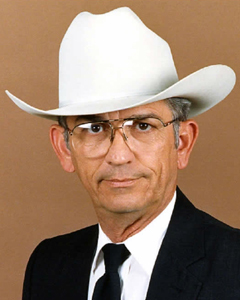 Milton Wright in a white cowboy hat