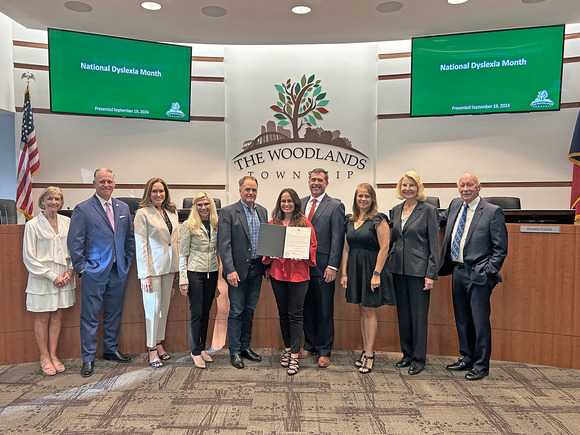 Group photo of board with people who were given the proclamation