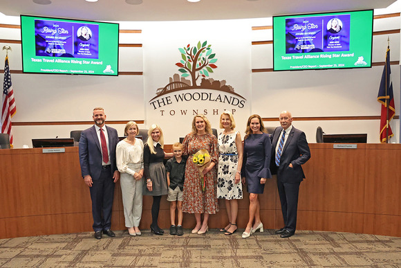 Photo of Josie Lewis and the Board of Directors along with her son, Jackson