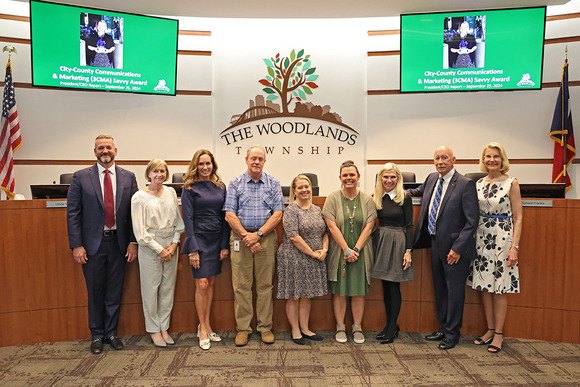 Photo of communication staff with Board of Directors