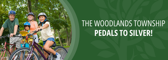 The Woodlands Township Pedals to Silver! Photo of a family riding bikes