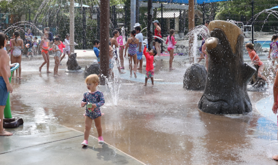 Photo of children playing in the water at a sprayground
