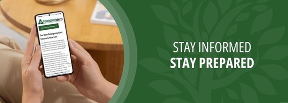 Stay Informed and prepared. Image of a cell from displaying Township Alerts