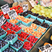 Farmer's market stall selling fruit